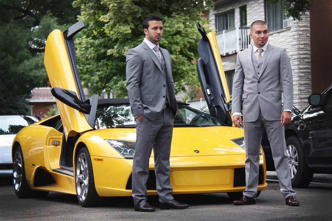 astonishing wedding groom best man with stylish sport car on background colored wedding photo by lavimage montreal