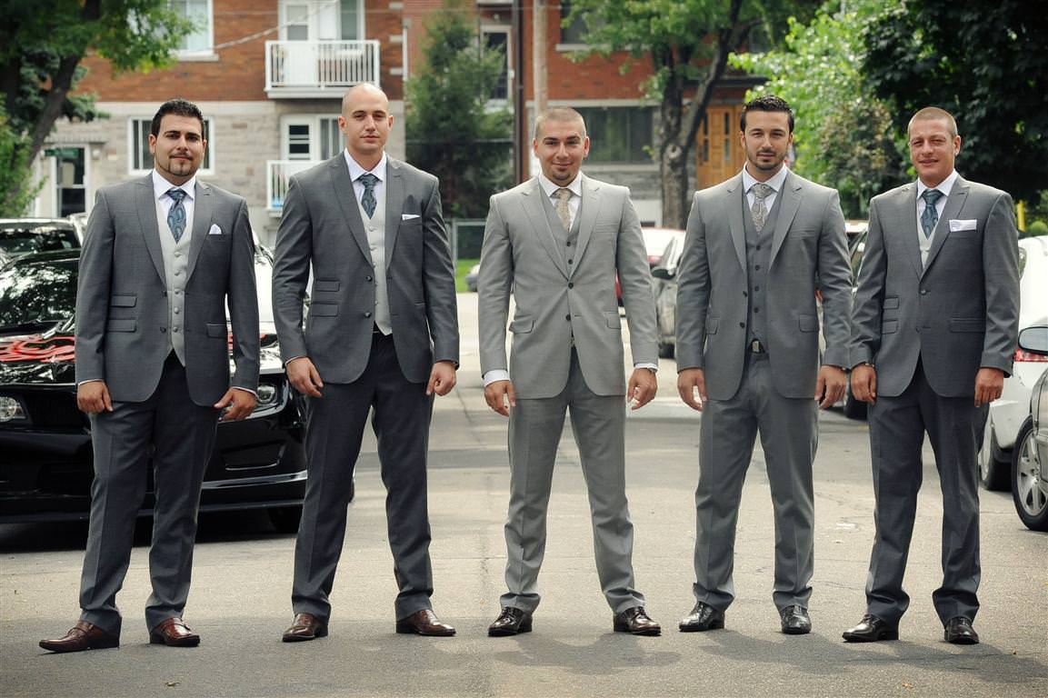 astonishing wedding groom surrounded by best men colored group wedding portrait by lavimage montreal