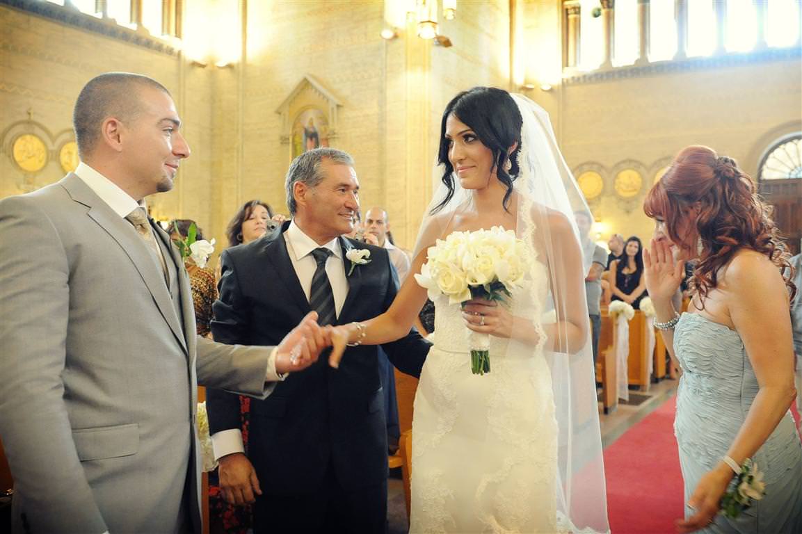 astonishing wedding ceremony bride takes groom's hand moment colored wedding photo by lavimage montreal