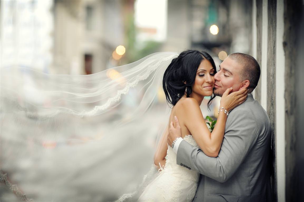 astonishing wedding couple together artistic shot with flying veil colored photo by lavimage montreal