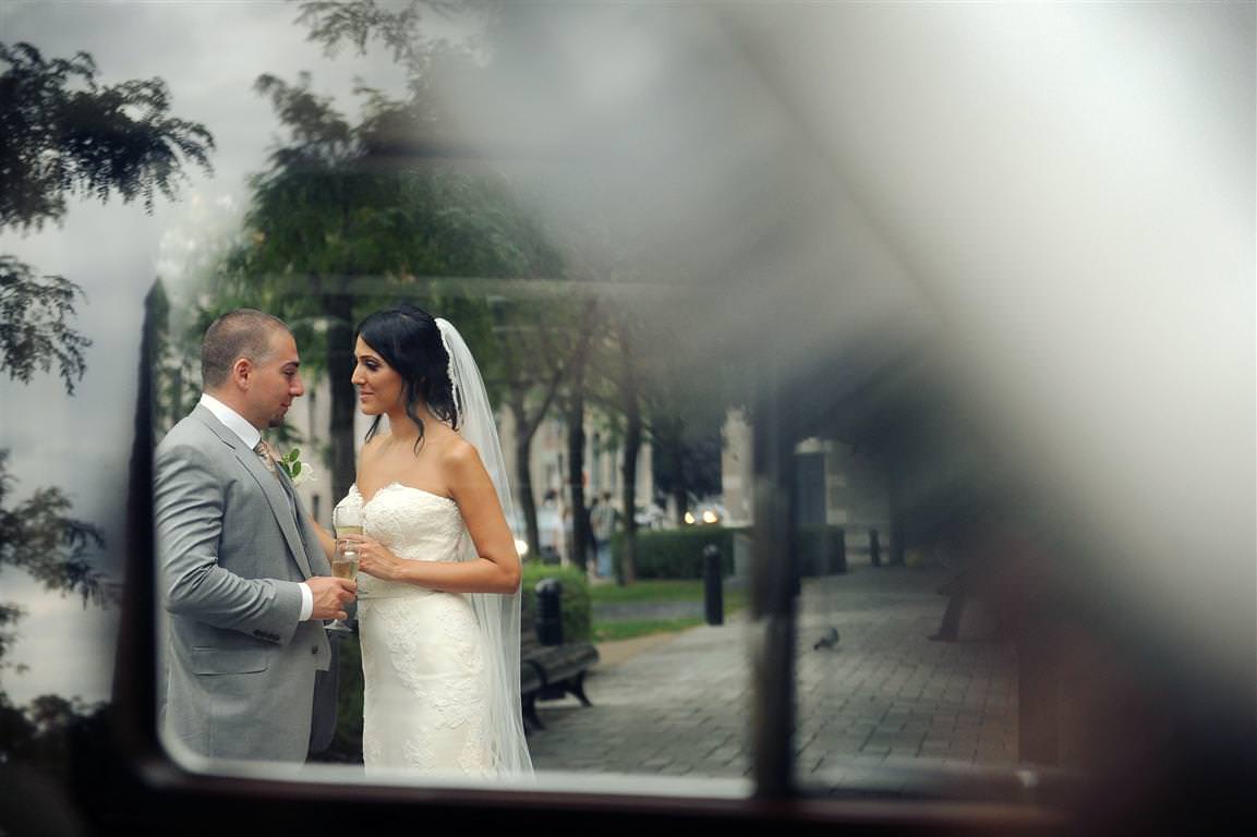 astonishing wedding couple together city walk colored artistic shot with reflection by lavimage montreal