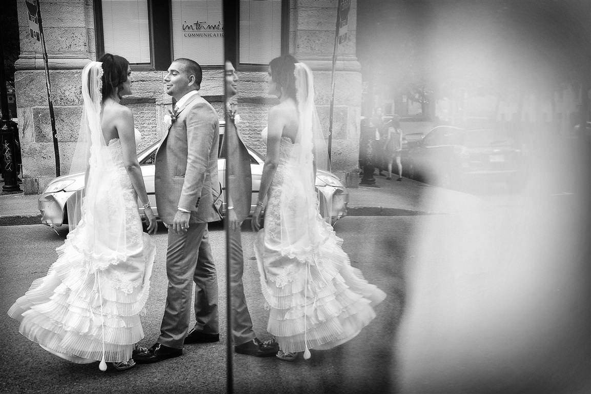 astonishing wedding couple together city walk black white artistic shot with reflection by lavimage montreal