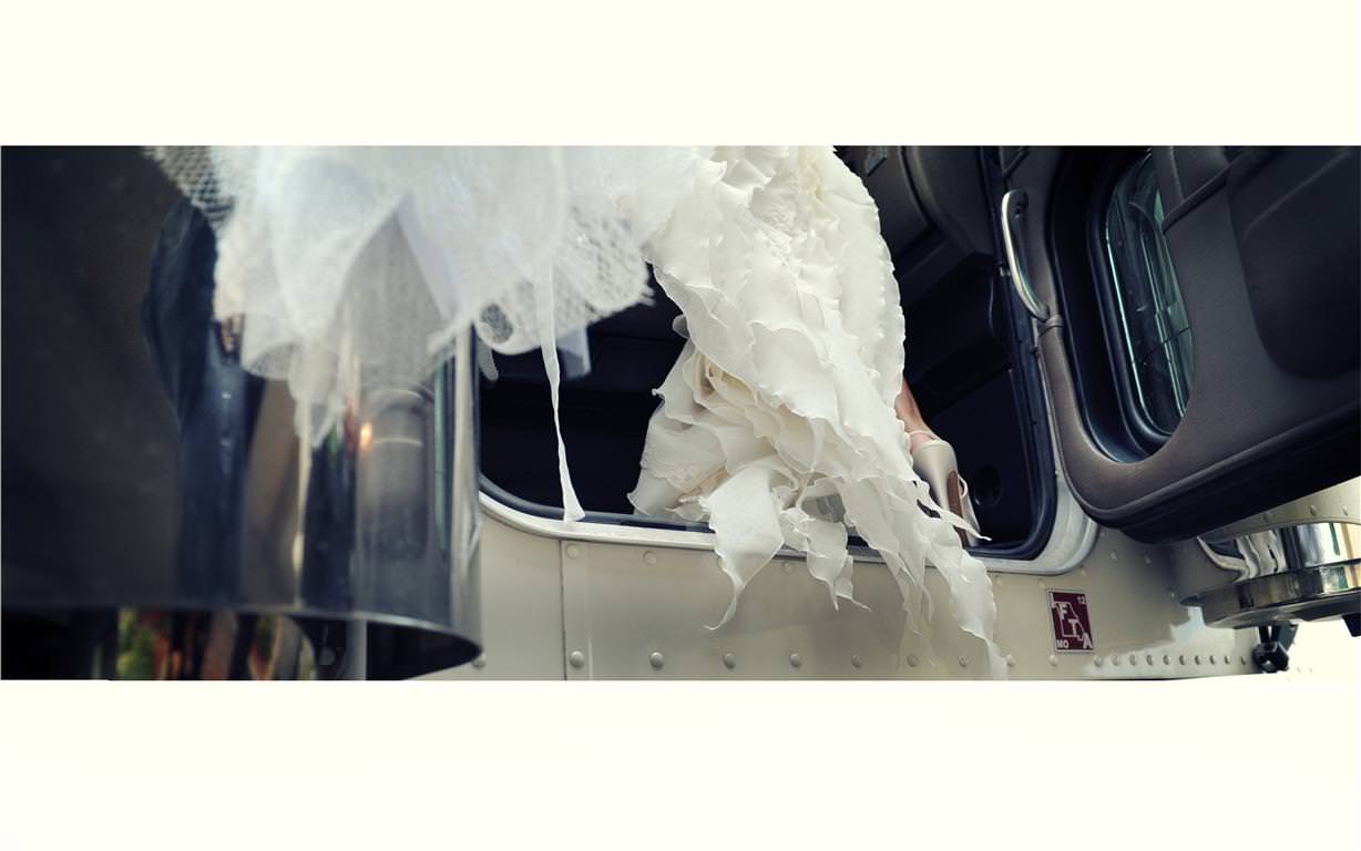 heavenly wedding bride jumps into car fragment by lavimage montreal