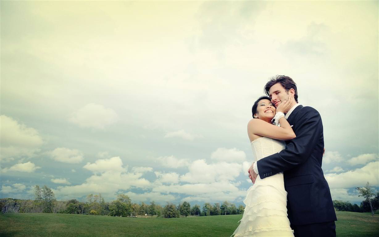 heavenly wedding couple together with sky on background colored artistic shot by lavimage montreal