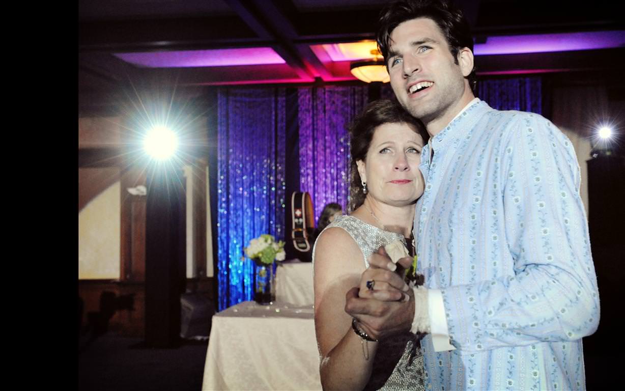 heavenly wedding groom dancing with mother emotional shot by lavimage montreal
