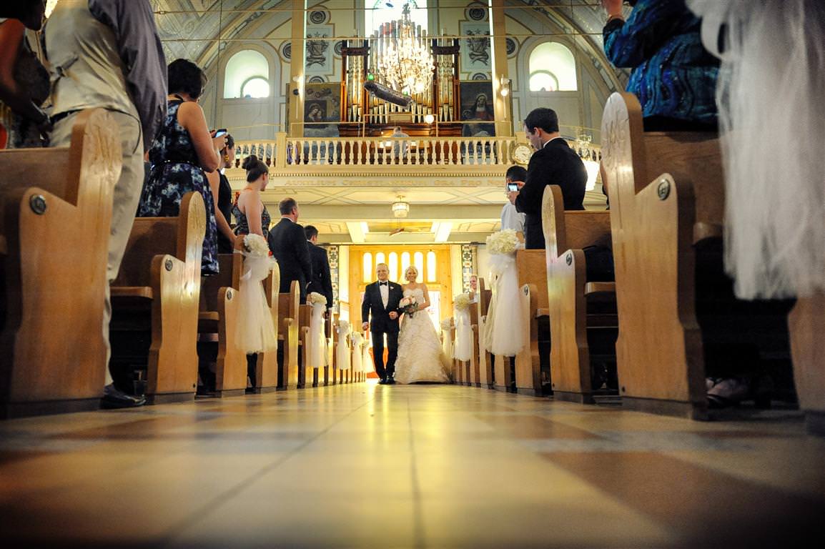 colored wedding photos ceremony father leads bride to altar by lavimage montreal