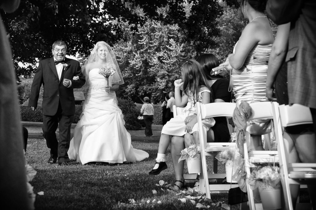 black white wedding photos ceremony father takes bride to altar by lavimage montreal