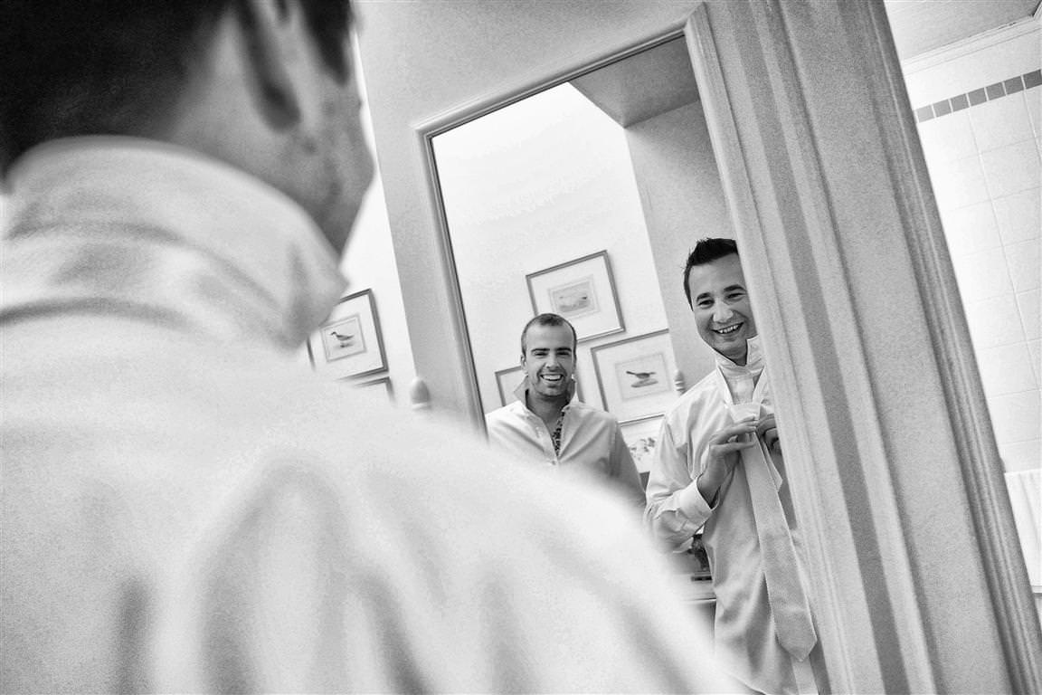 black white wedding photos getting ready groom best man mirror cravat by lavimage montreal