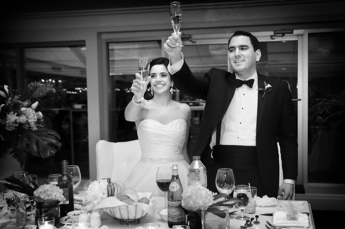 black and white wedding pictures couple together reception toast by lavimage montreal