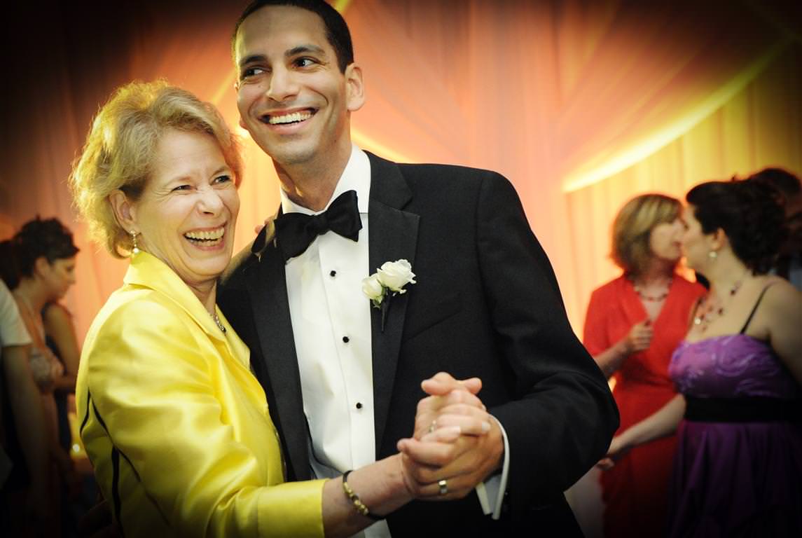 coloder wedding photos groom mother touching dance by lavimage montreal at the Science Centre Wedding