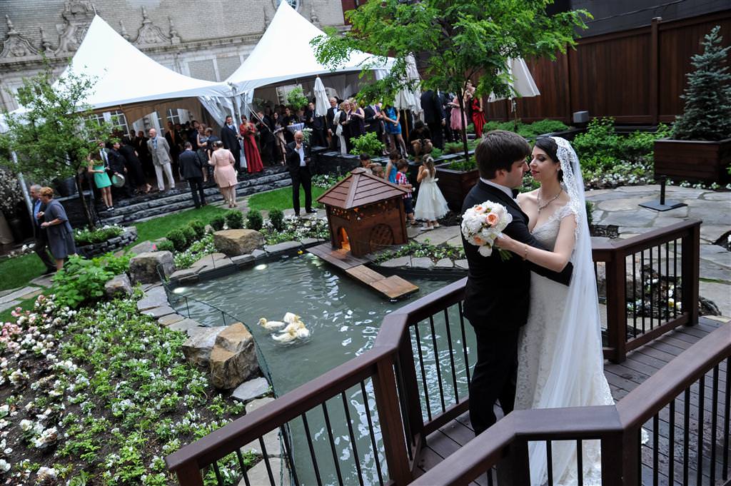 colored wedding photos celebration bride groom bridge garden guests by lavimage montreal Ritz Carlton wedding