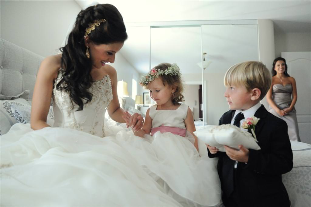 Bride with ring bearer and flower girl  at the Golf St Raphael photographed by La V image wedding photographer montreal