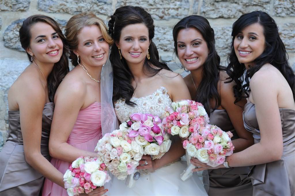 Bride with bridesmaids at the Golf St Raphael wedding photographed by La V image wedding photographer montreal