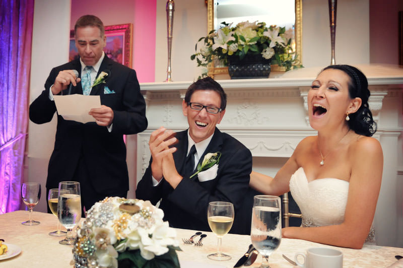 a funny speech bride and groom laughing  at the vineyard wedding photographed by La V image-Montreal wedding photographer 