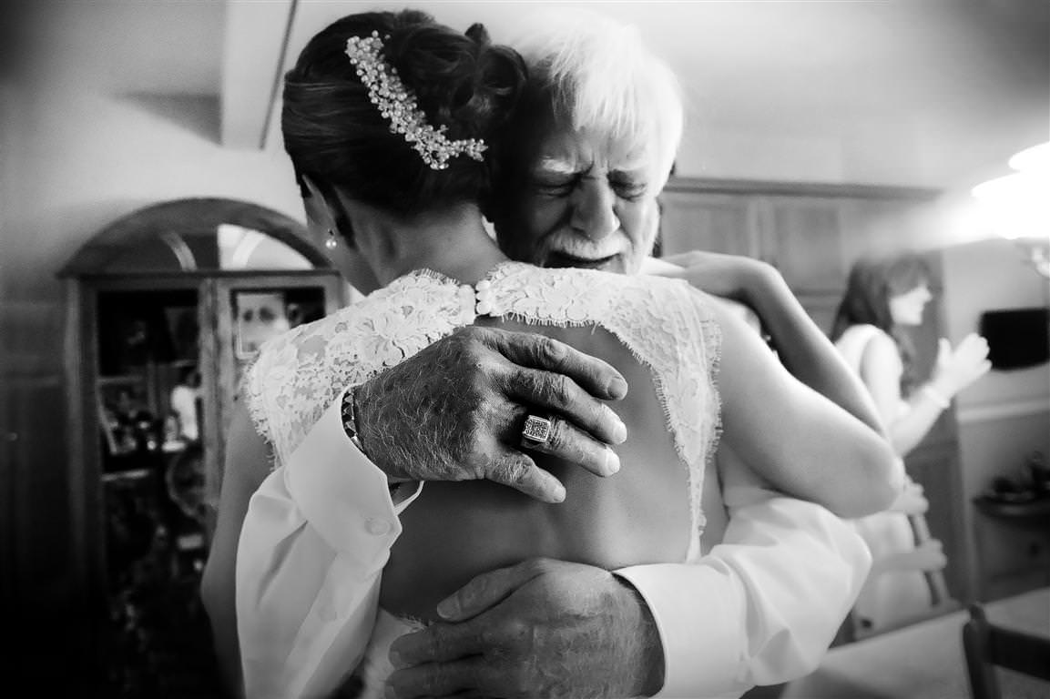 Parents at wedding-father hugs his daughter by La V image Montreal wedding photographer