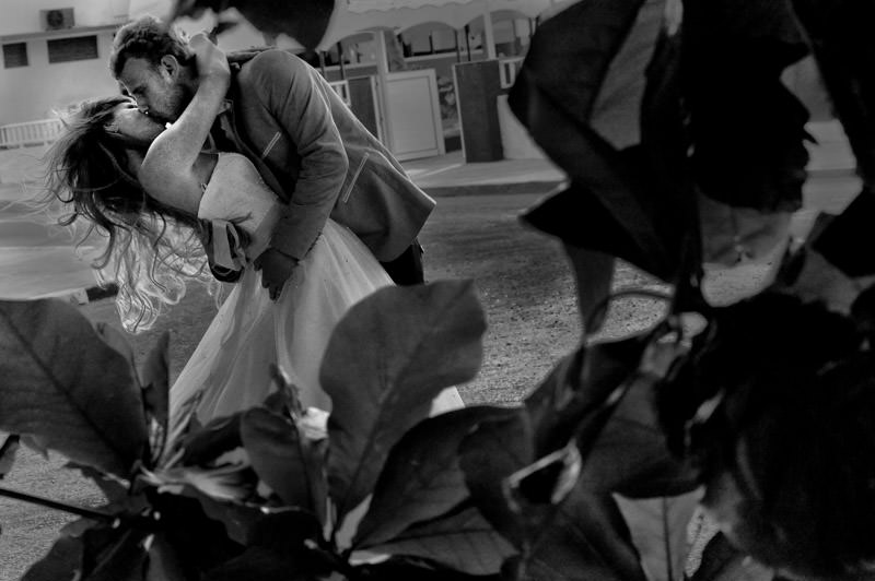 bride and groom kissing at the romantic session in the city of Varadero at the destination wedding in Cuba by La V image photography - Montreal wedding photograpgher